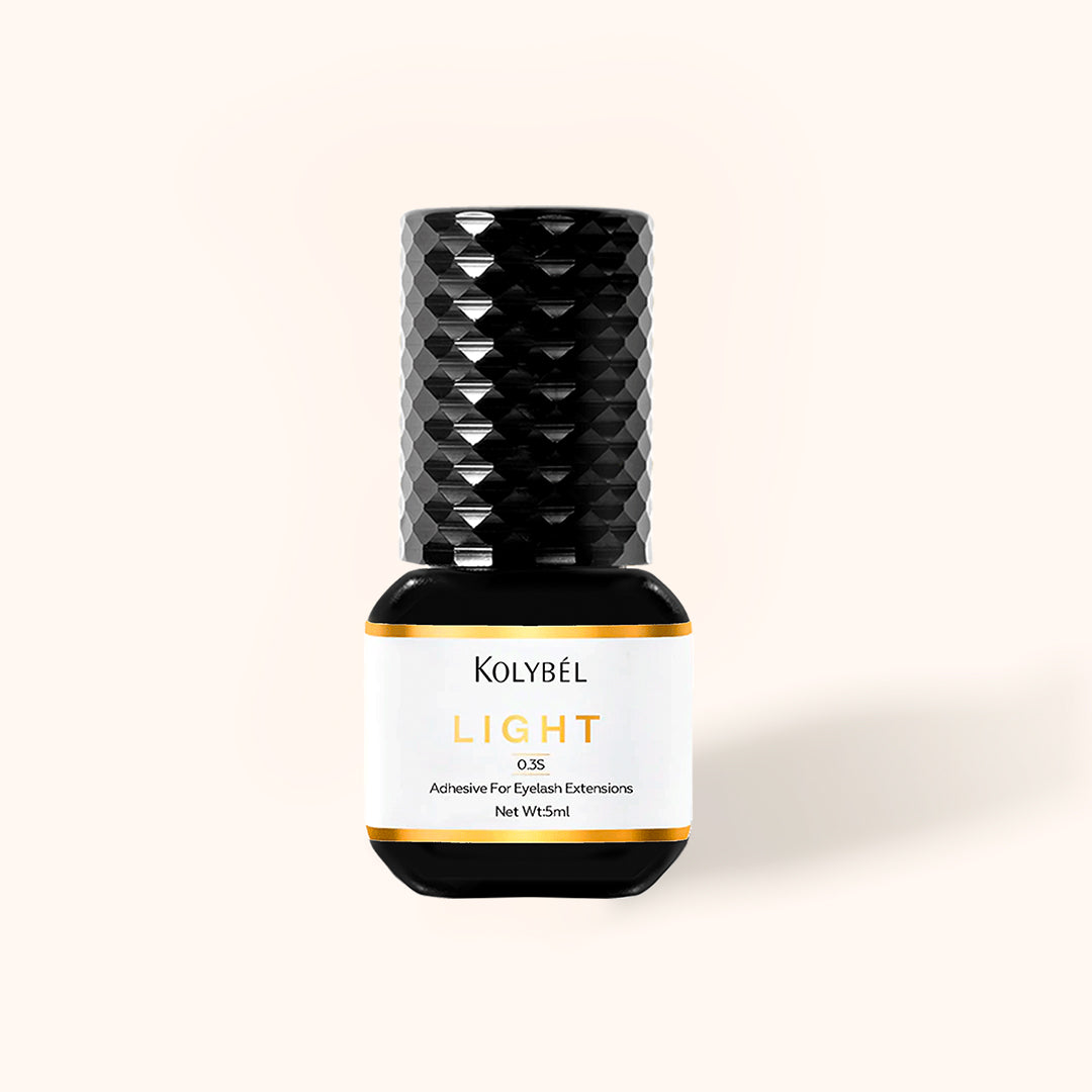 0.3 Second LIGHT Adhesive Eyelash Extension Glue (5ml)-kolybel-This professional eyelash extension adhesive offers ultra-fast 0.3 second drying time and long-lasting retention for experienced lash artists. Its non-toxic formula with glossy black finish is designed for use in controlled salon conditions to create durable, natural-looking lash sets.